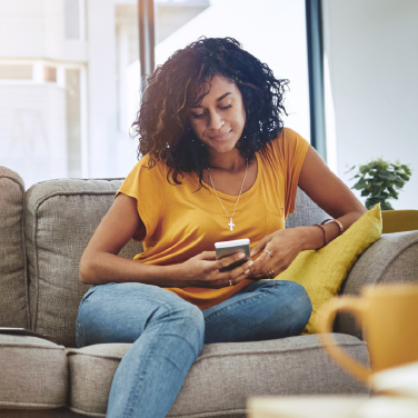 Mobile Alerts woman on phone at desk