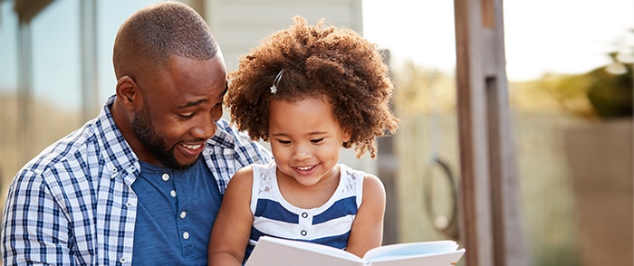 Father and daughter laughing