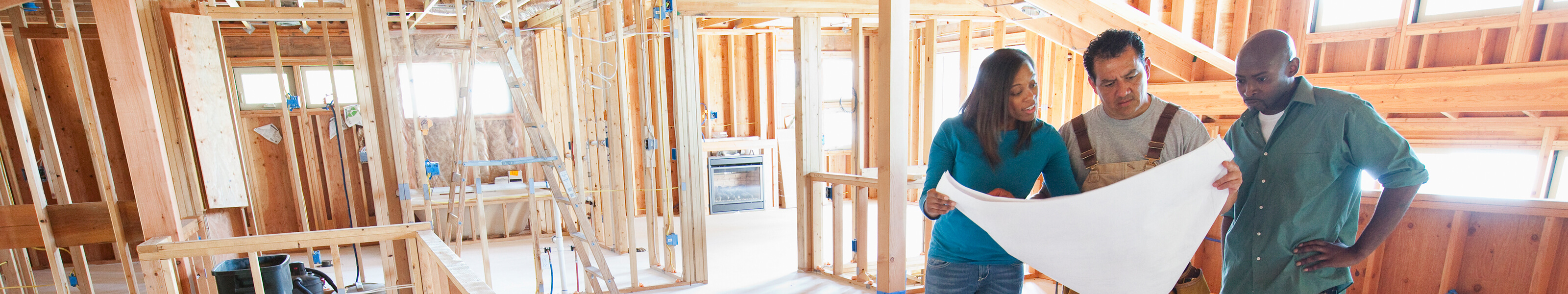 Construction worker going over plans