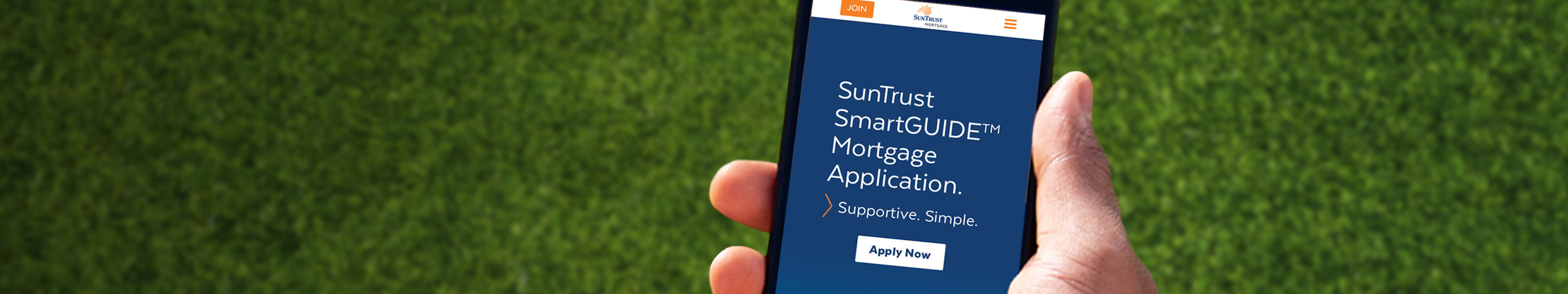 It's time for a smarter mortgage experience. Get started. Hand holding smartphone with Smart Guide application on screen to apply for a mortgage.