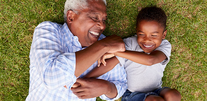 Grandfather playing with grandson "What to do with IRA Distributions You Don't Need for Income"